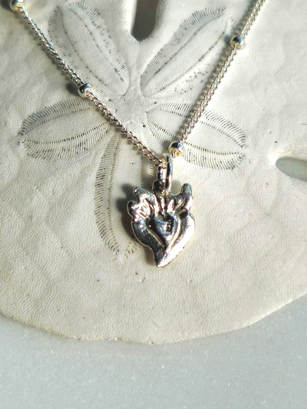 Tiny Sacred Heart Necklace in Sterling Silver